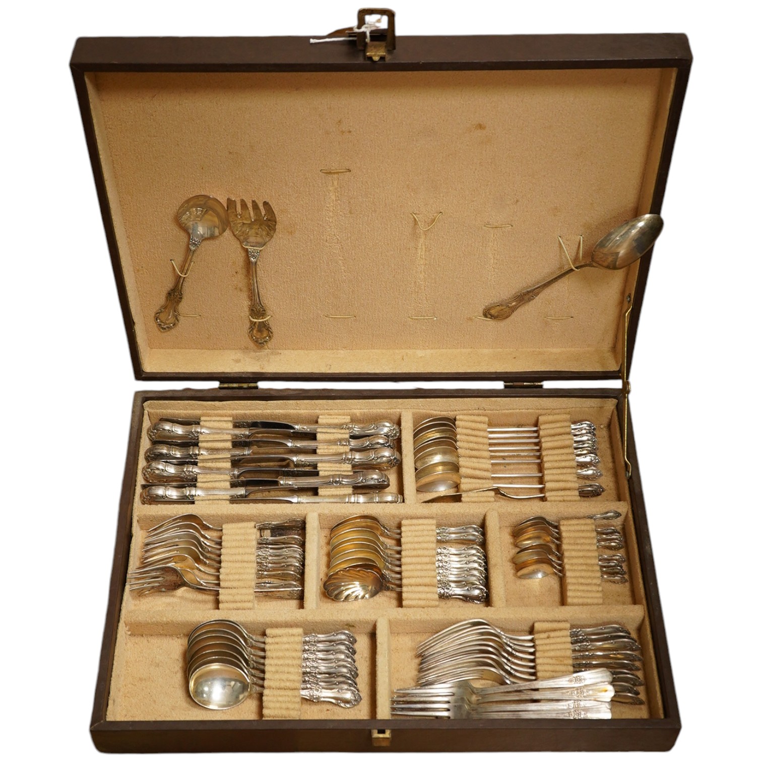 A cased part canteen of American sterling cutlery, weighable silver 63.8oz, together with four silver plated table forks. Condition - poor to fair